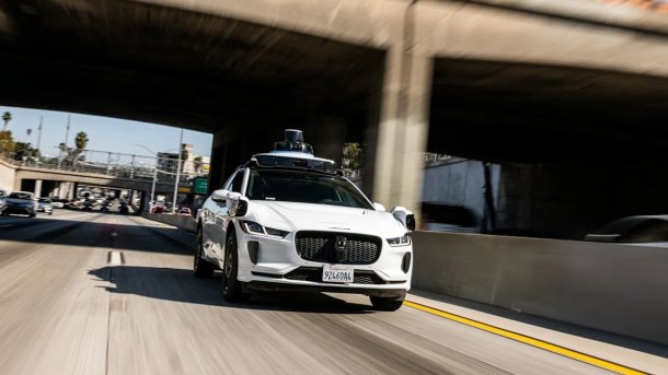 Waymo robotaxi on the freeway