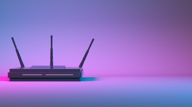 A router that looks like it belongs to an alien. The background is purple.