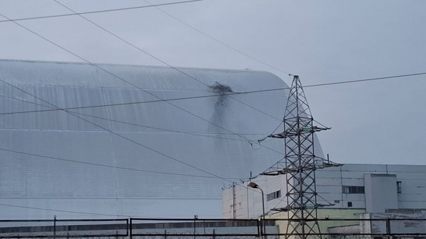 View of the impact site of the Russian drone on the containment structure of the damaged Chernobyl reactor on February 14, 2025.