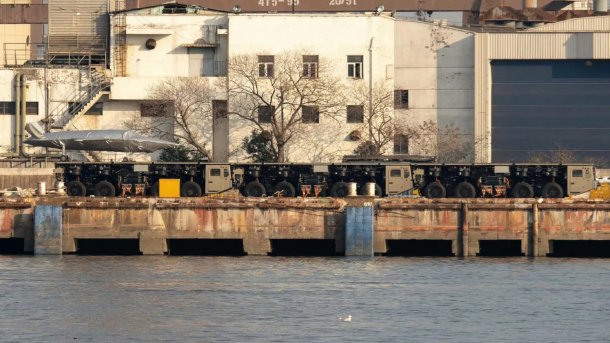Three suspected catapult prototypes are on the dock of a shipyard in eastern China.