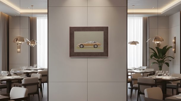 Digital picture frame from Pocketbook on a room wall