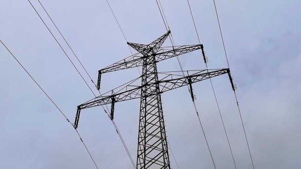 High-voltage pylon with cables