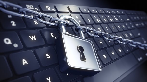 Lock,With,Chain,On,A,Computer,Keyboard,-,3d,Illustration
