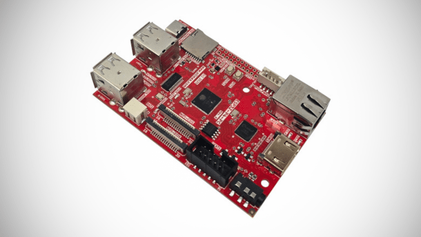 Rotes Entwicklungsboard „ESP32-P4-PC“ von Olimex in Schrägansicht, mit deutlich sichtbaren USB‑Buchsen, Ethernet‑Port, HDMI‑Anschluss, Micro‑SD‑Slot und weiteren Steckleisten sowie SMD‑Bauteilen auf der Oberseite, vor neutral grauem Hintergrund.