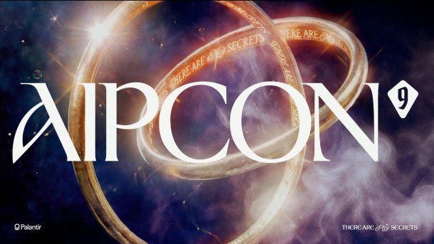 AIPCon-Schriftzug mit Ringen im Hintergrund