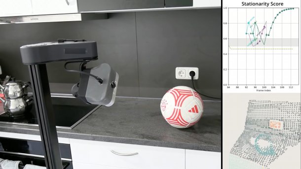 Roboter scannt Ball auf einer Küchenplatte.