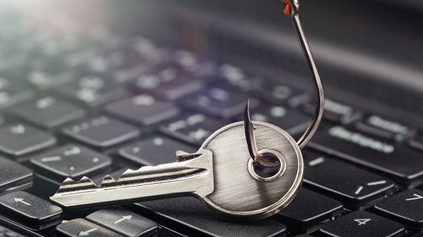 A jagged key lies on a laptop keyboard