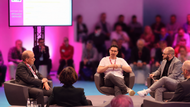 Karsten Klohs (achelos), Carlo Ulbrich (Nect GmbH), Pascal Jeschke (BSI) in a panel discussion