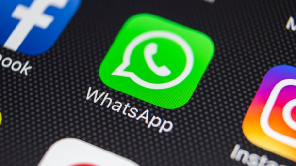 WhatsApp icon on a smartphone screen