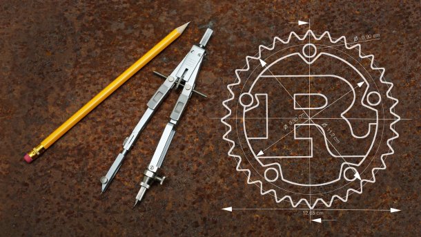Rust logo, pencil, compass
