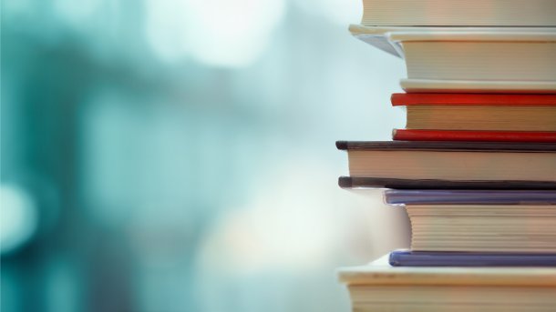 Stack of books against a blurred background