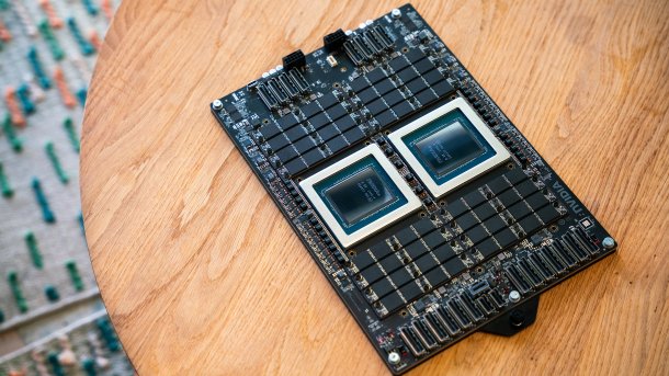 Server board with two CPUs lies on a wooden table