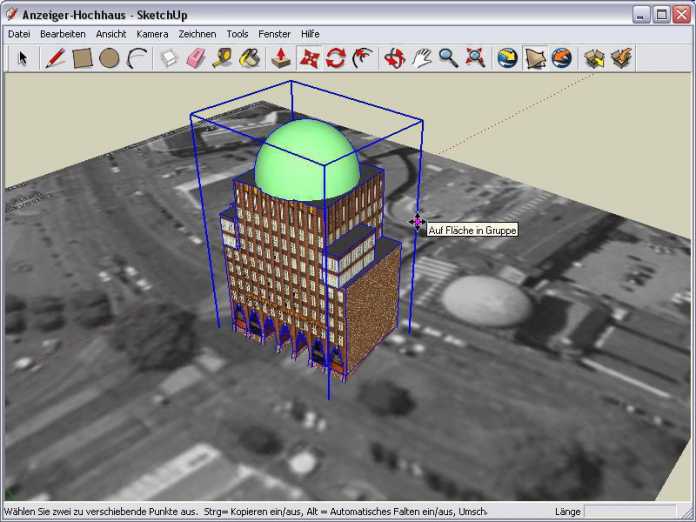 SketchUp importiert das Luftbild aus Google Earth als Unterlage für die gruppierten Gebäudeteile.