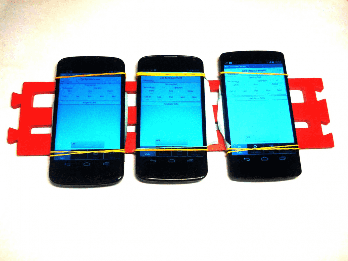 Drei zusammengebundene Handys
