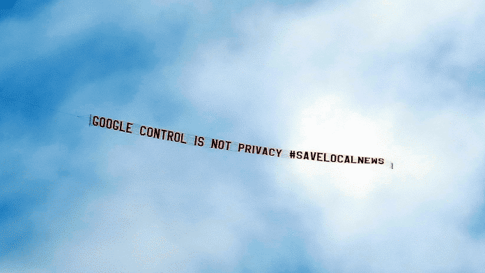 Banner &quot;Google Control is not Privacy #SaveLocalNews&quot;