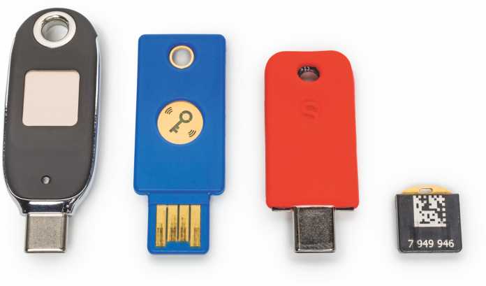 Kleine FIDO2-„Sicherheitsschlüssel“ verbinden sich per USB, Bluetooth oder NFC mit PC und Smartphone, um Online-Konten zu schützen.