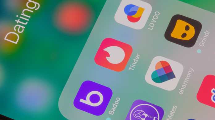 Handybildschirm mit Icons verschiedener Apps, darunter Tinder, Lovoo, eharmony und Grindr