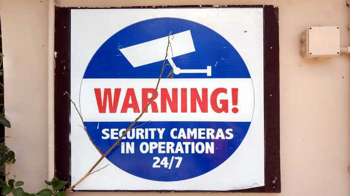 Schild "Warning! Security Cameras in Operation 24/7"