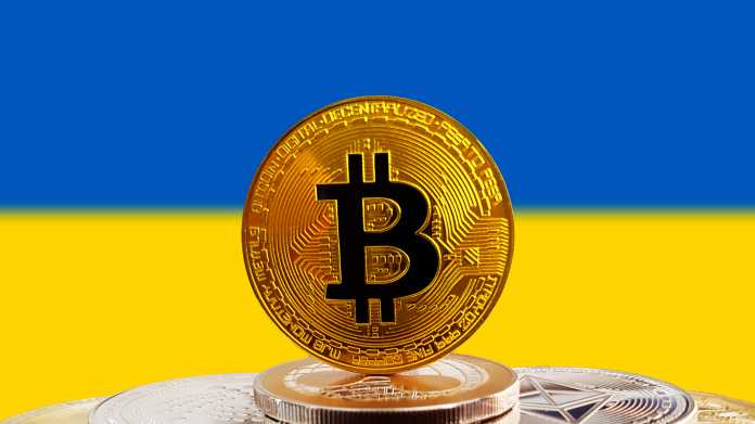 Bitcoin,Btc,On,Stack,Of,Cryptocurrencies,With,Ukraine,Flag,In
