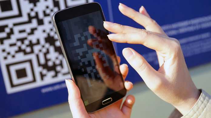 Moscow,-,January,2020:,Qr,Code,,Scanning,With,A,Smartphone.