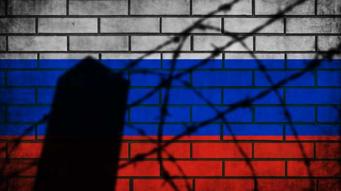 Russian,Flag,With,Barbed,Fence.,Conflict,And,War,Concept.,Grunge