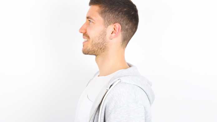 Profile,Of,Smiling,Young,Caucasian,Man,Wearing,Casual,Clothes,Over