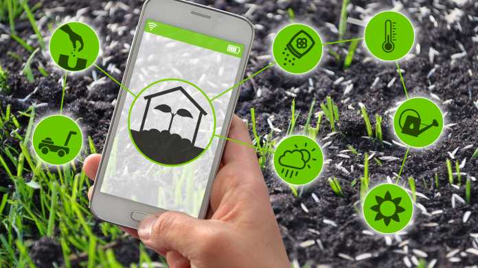Smartphone,With,Smart,Farming,And,Smart,Gardening,Apps,In,Front
