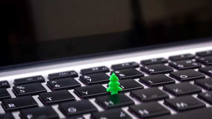 Christmas,Tree,And,Keyboard.small,Green,Plant,Growing,From,Black,Computer