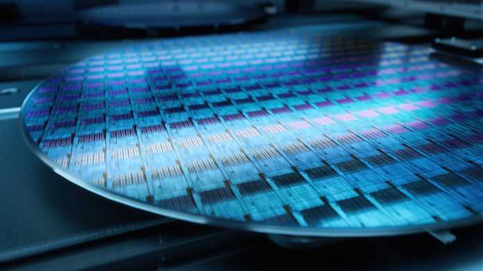 Macro,Shot,Of,Silicon,Wafer,During,Production,At,Advanced,Semiconductor