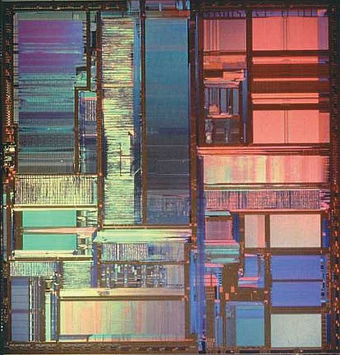 Die-shot (micrograph) of the Intel Pentium with 3.1 million transistors from the 0.8 micron fabrication