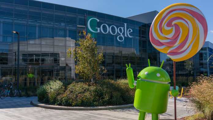 Android mit Lolli vor Google-Gebäude