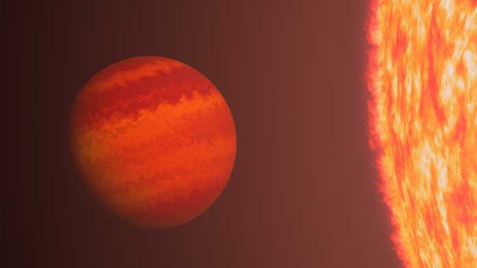 Roter Exoplanet extrem nah an RIesenstern