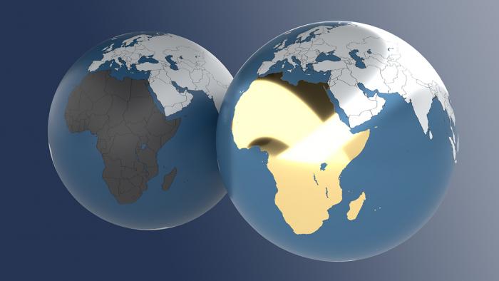 Zwei Erdkugeln: Afrika einmal dunkel, einmal golden.