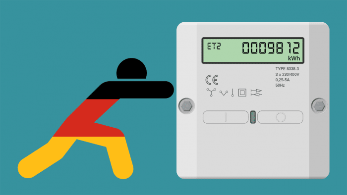 Männchen in Deutschland-Farben schiebt Smart-Meter an