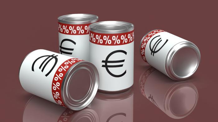 Dosen mit Euro- und Prozentzeichen