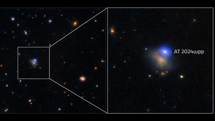 Ein blauer Lichtpunkt in einer Galaxie