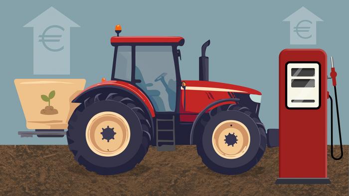 Traktor mit Düngeanbau und Zapfsäule mit Europfeilen nach oben